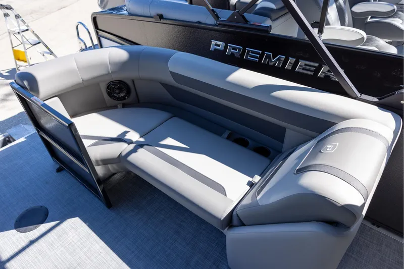Slide: The Image of 2026 Premier 220 Sunscape RF boat interior with luxurious gray seating and cup holders. - 6