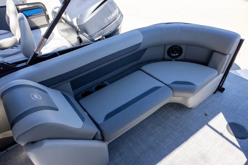 Slide: The Image of 2026 Premier 220 Sunscape RF boat interior with gray seating and Yamaha engine. - 7