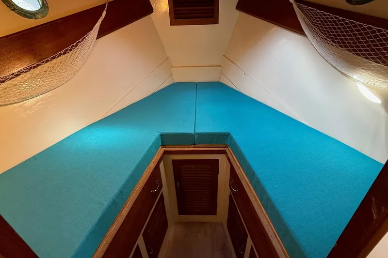 Slide: The Image of Custom 44 Troller - Forward Cabin Berth / Storage - 6