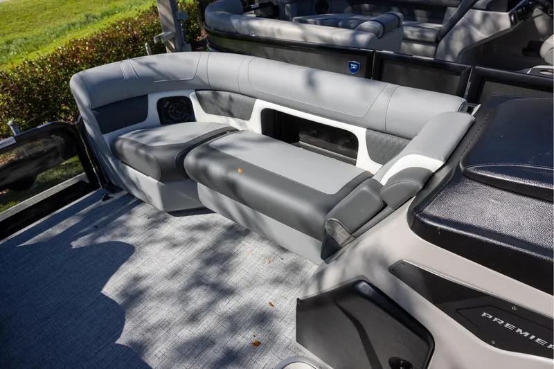 Slide: The Image of 2026 Premier 230 Solaris RF boat interior with gray seating and modern design. - 10