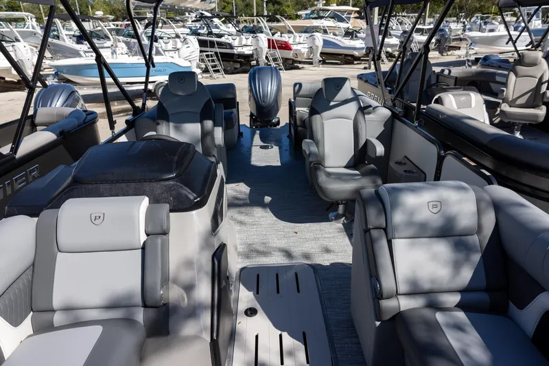Slide: The Image of 2026 Premier 230 Solaris RF boat interior with luxurious seating and modern design. - 11