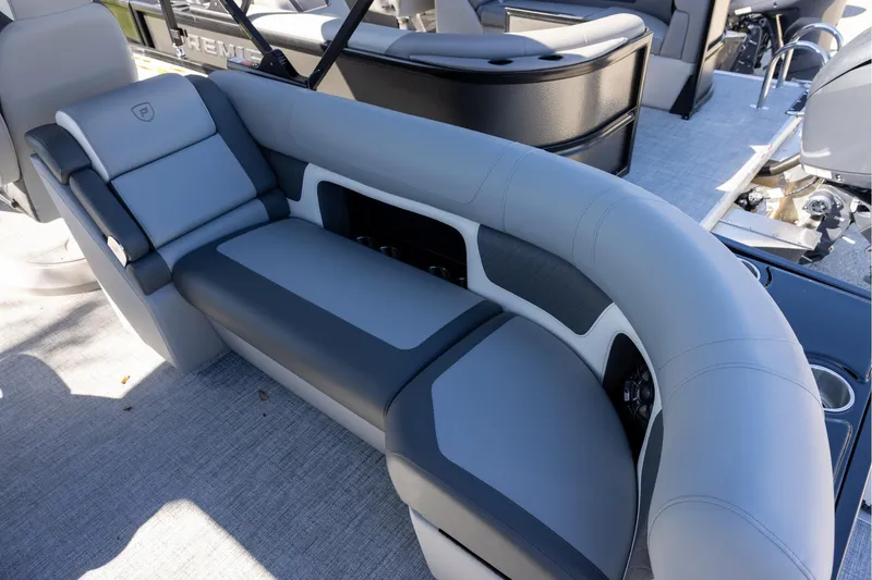 Slide: The Image of Luxurious seating on 2026 Premier 230 Solaris RF boat, featuring sleek gray upholstery. - 5