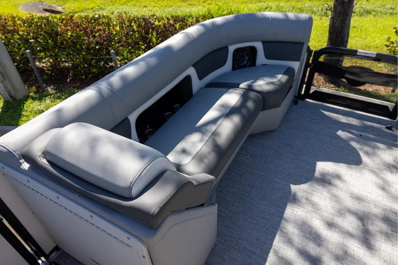 Slide: The Image of Luxurious seating on 2026 Premier 230 Solaris RF boat, featuring sleek gray upholstery. - 9