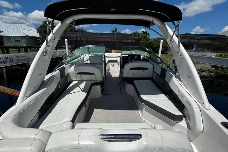 Slide: The Image of 2021 Regal 26 OBX boat interior with spacious seating and sleek design. - 18