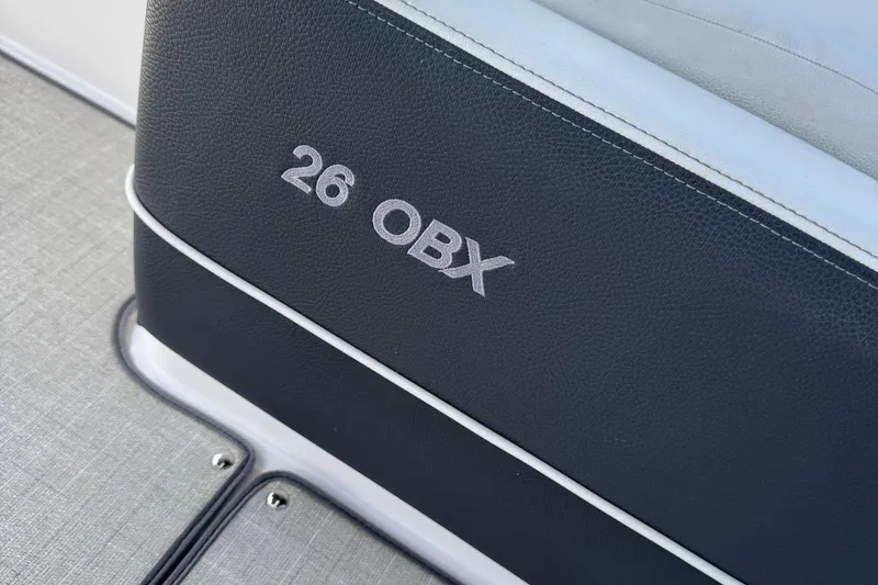 Slide: The Image of 2021 Regal 26 OBX boat interior detail with logo on seat. - 23