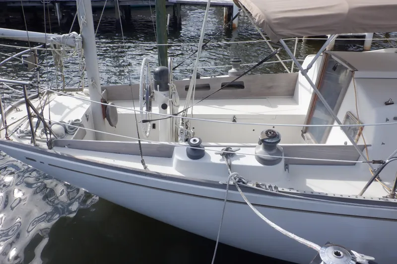 Slide: The Image of 1979 Bristol Yawl sailboat docked, featuring a spacious cockpit and classic design. - 6