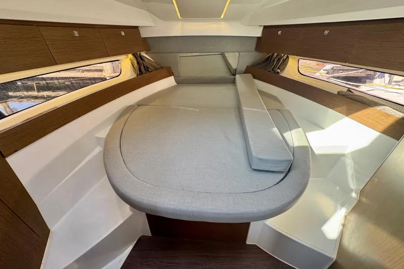 Slide: The Image of 2020 Jeanneau NC 895 cabin interior with modern design and comfortable seating. - 24