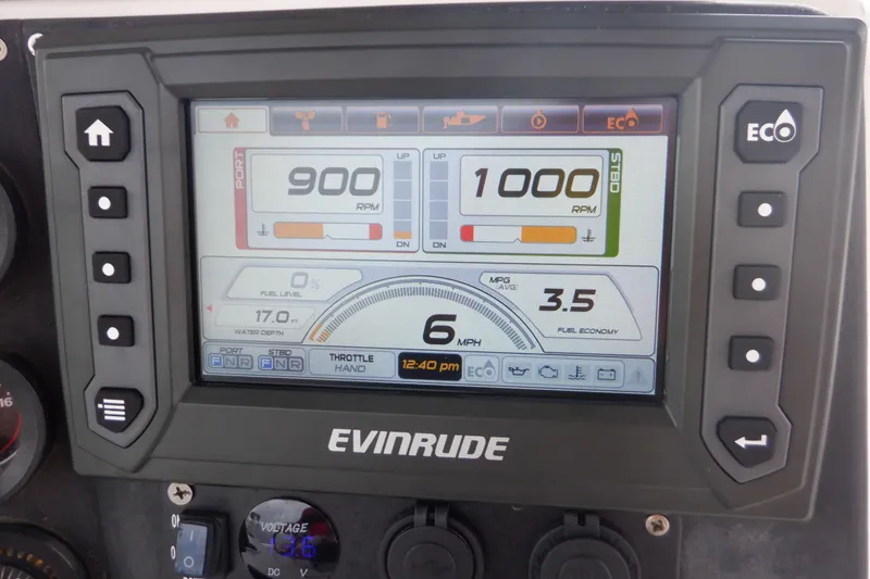 Slide: The Image of Evinrude display on 1995 Ocean Master 31 Center Console showing RPM and fuel economy. - 18