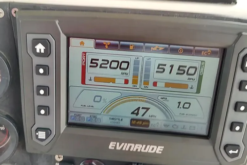 Slide: The Image of Evinrude display showing RPM, speed, and fuel data on Ocean Master 31 Center Console, 1995. - 21