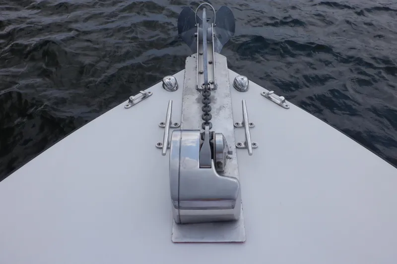 Slide: The Image of Bow of 1995 Ocean Master 31 Center Console with anchor and chain mechanism. - 35