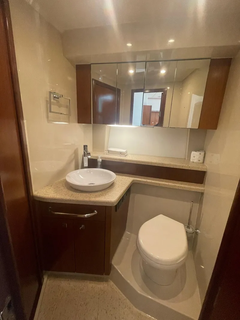 Slide: The Image of Luxurious bathroom in 2012 Cruisers Yachts 48 Cantius with modern fixtures and elegant design. - 18