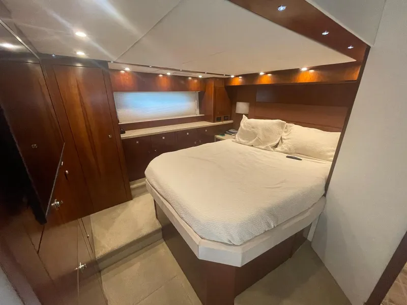 Slide: The Image of Luxurious bedroom interior of 2012 Cruisers Yachts 48 Cantius with elegant wood finishes. - 20
