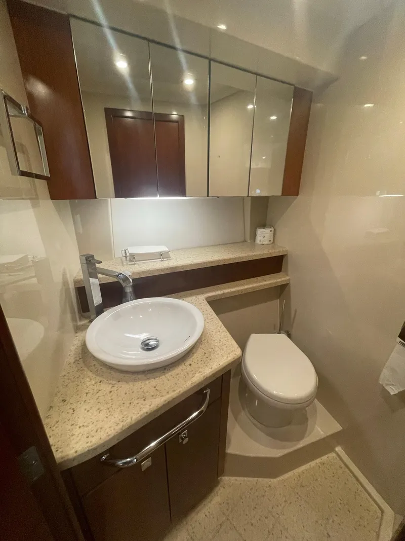 Slide: The Image of Luxurious bathroom in 2012 Cruisers Yachts 48 Cantius with modern fixtures and elegant design. - 15