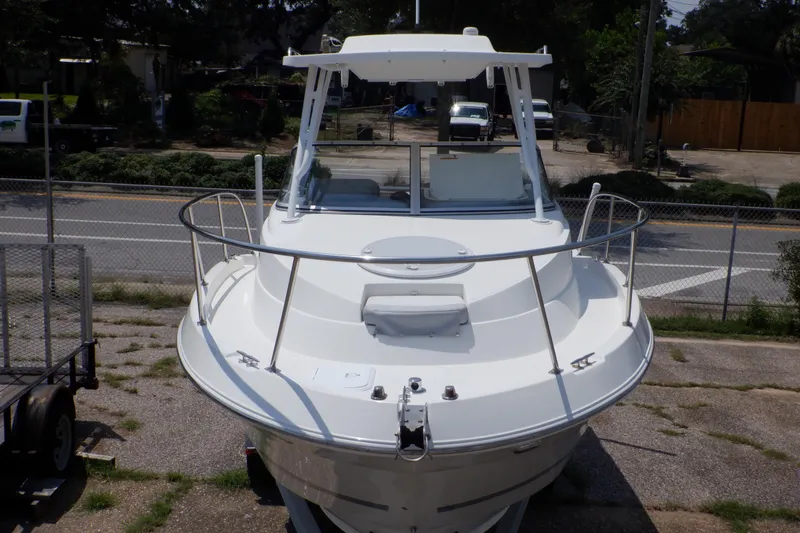 Slide: The Image of 2015 Seaswirl Striper 220 Walkaround boat on display, front view. - 1