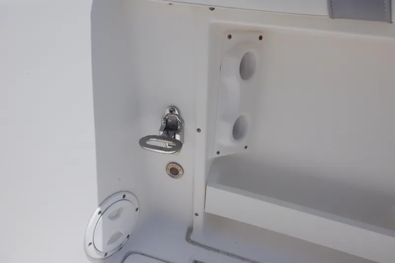 Slide: The Image of 2015 Seaswirl Striper 220 Walkaround boat interior detail with step and storage. - 15