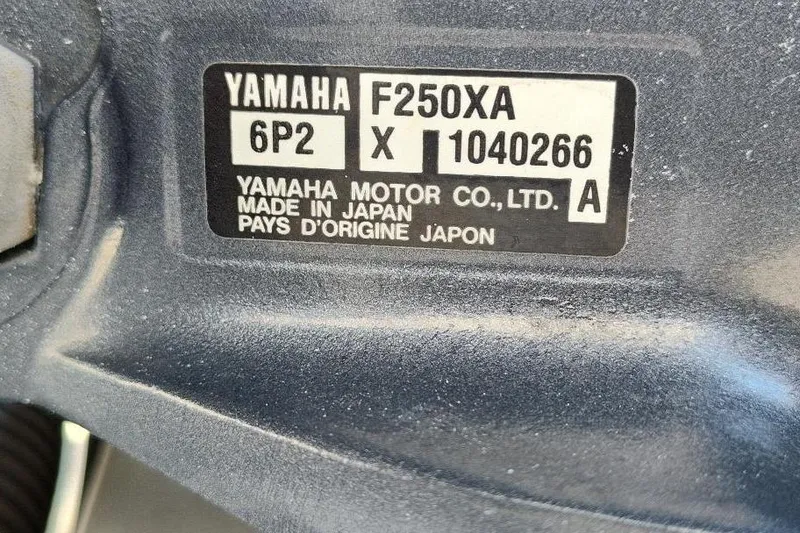 Slide: The Image of Yamaha F250XA engine label on 2015 Seaswirl Striper 220 Walkaround, made in Japan. - 37