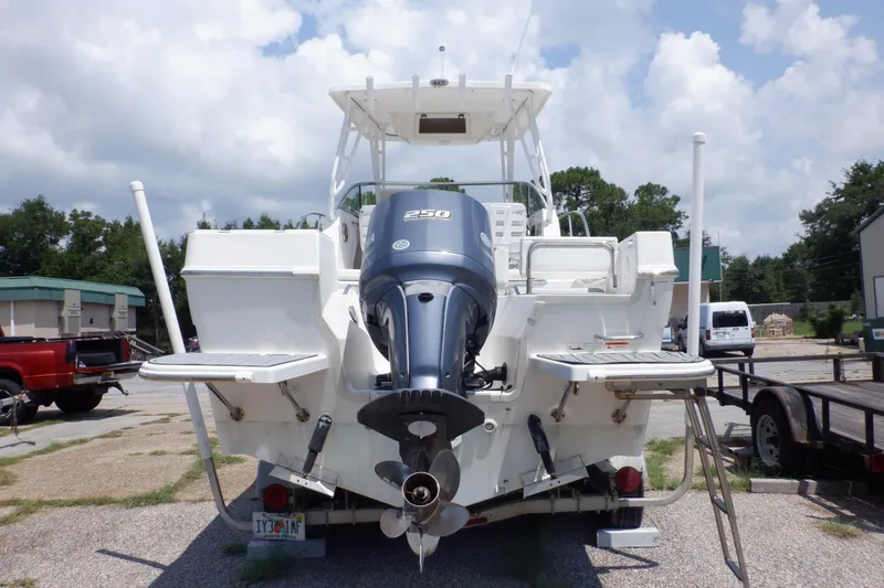 Slide: The Image of 2015 Seaswirl Striper 220 Walkaround boat with Yamaha 250 outboard motor, rear view. - 4