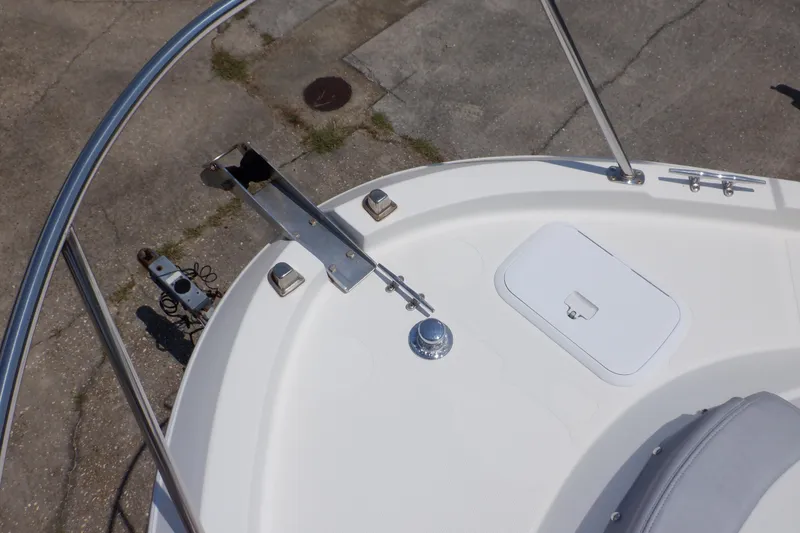 Slide: The Image of 2015 Seaswirl Striper 220 Walkaround boat deck with anchor holder and hatch. - 7