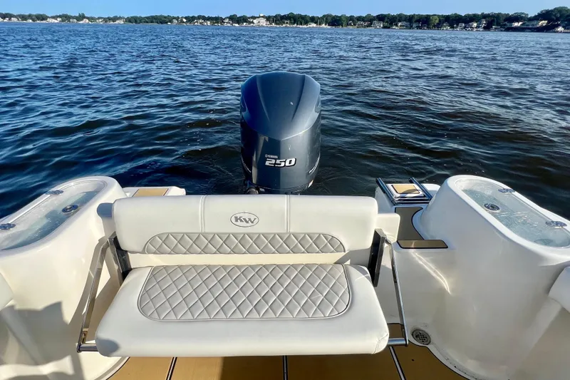 Slide: The Image of 2011 Key West 244 Center Console boat with Yamaha 250 engine on a lake. - 15