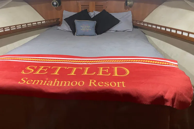 Slide: The Image of Cozy cabin bed in 1981 Cheer Men PT 38 Europa with Semiahmoo Resort blanket. - 38