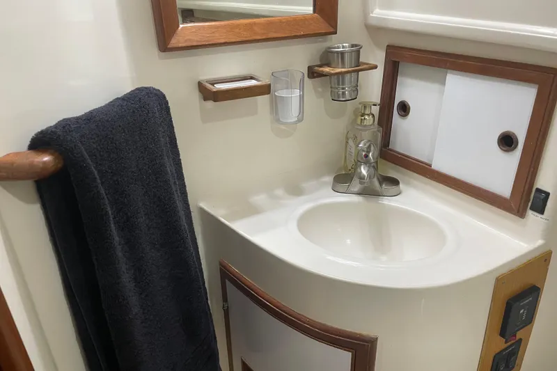 Slide: The Image of Compact bathroom in 1981 Cheer Men PT 38 Europa yacht with sink and towel. - 44