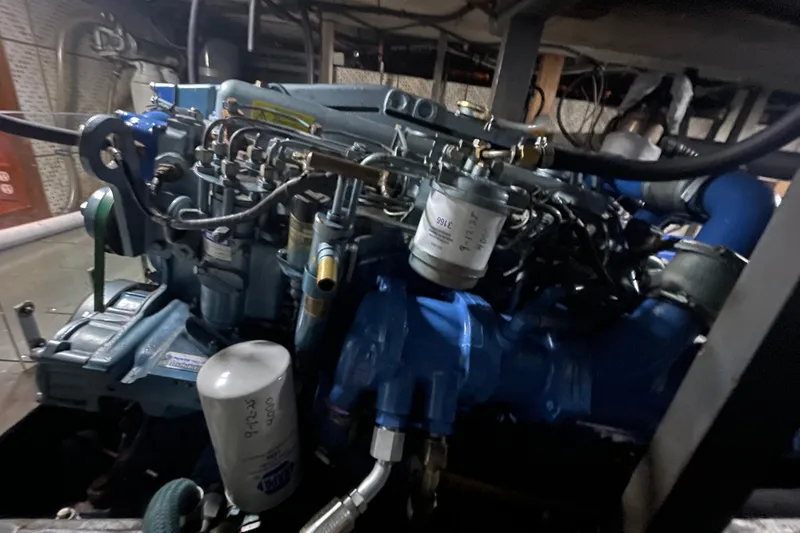 Slide: The Image of 1981 Cheer Men PT 38 Europa engine with visible components and wiring. - 52