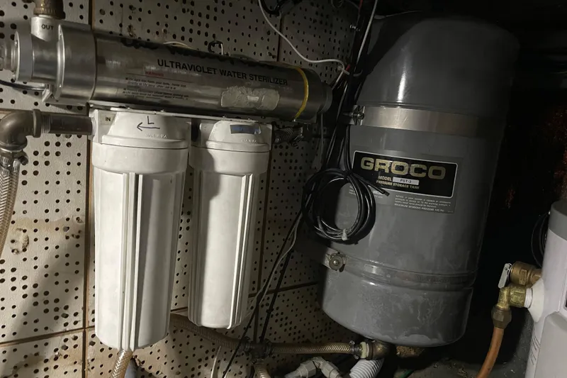 Slide: The Image of Ultraviolet water sterilizer and Groco pressure tank in Cheer Men PT 38 Europa, 1981. - 57