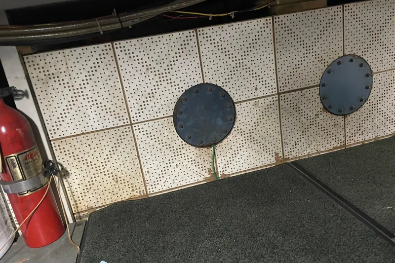 Slide: The Image of 1981 Cheer Men PT 38 Europa interior with fire extinguisher and perforated panels. - 59