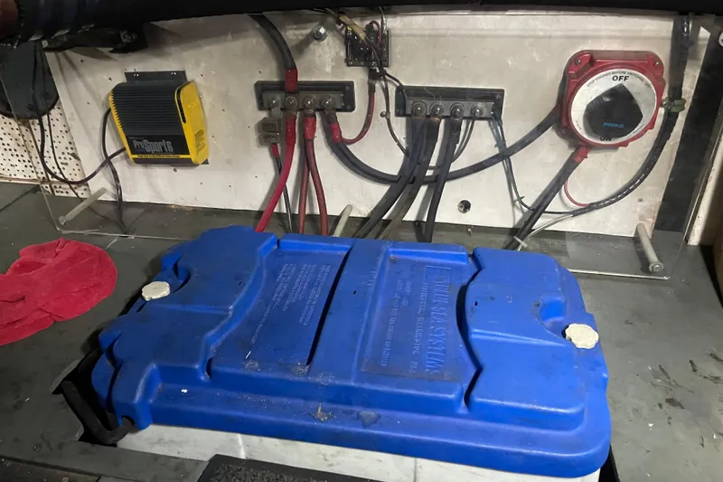 Slide: The Image of Electrical setup in a 1981 Cheer Men PT 38 Europa with blue battery cover. - 62