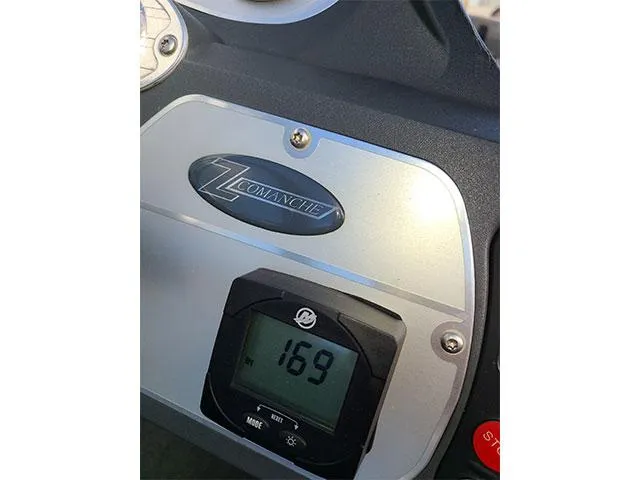 Slide: The Image of Dashboard of 2006 Ranger Z19 Comanche boat showing digital display reading 169. - 12