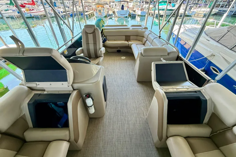 Slide: The Image of 2017 Bentley Pontoons 223 Cruise interior with spacious seating and storage compartments. - 15
