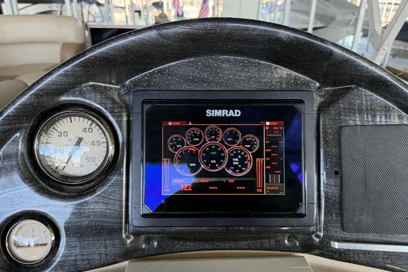 Slide: The Image of Dashboard of a 2017 Bentley Pontoons 223 Cruise with Simrad display and gauges. - 9