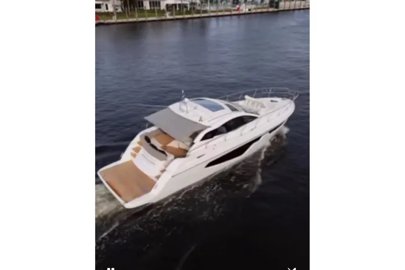 The Image of 2024 Sessa Marine C44 Cruiser navigating on open blue sea. - 0