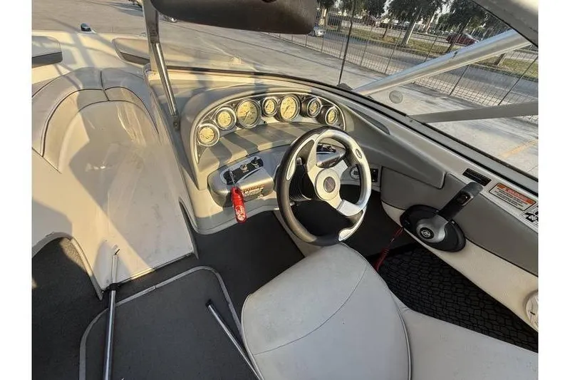 Slide: The Image of 2008 Bayliner 185 Bowrider dashboard with steering wheel and instrument panel. - 8