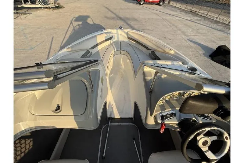 Slide: The Image of 2008 Bayliner 185 Bowrider interior view with steering wheel and dashboard. - 9