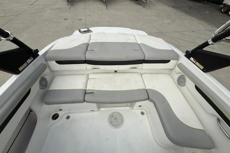 Slide: The Image of Interior seating of a 2019 Tahoe 700 boat, featuring gray and white cushioned seats. - 14