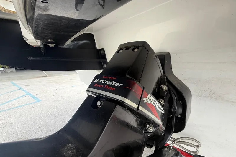 Slide: The Image of 2019 Tahoe 700 boat with MerCruiser Bravo Three outdrive. - 16