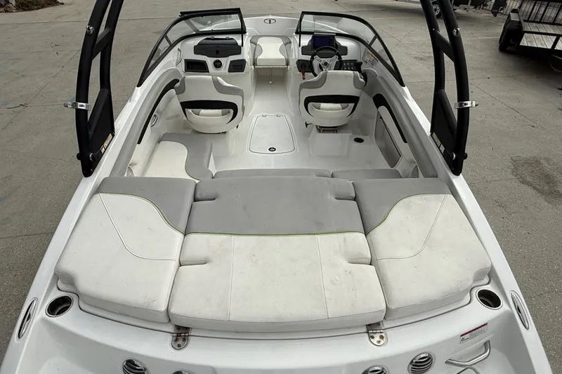 Slide: The Image of 2019 Tahoe 700 boat interior with spacious seating and modern dashboard design. - 8