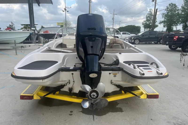 Slide: The Image of 2006 Nitro 189 Sport boat on trailer, rear view with outboard motor. - 6