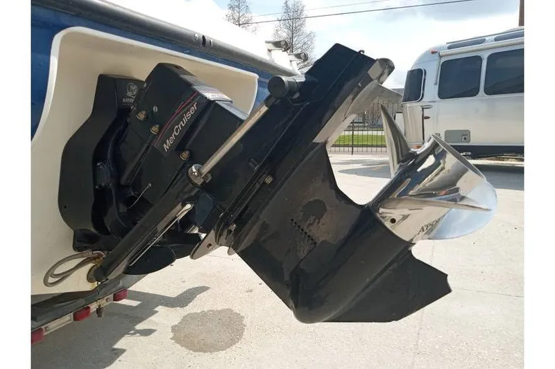 Slide: The Image of 2008 Bayliner 175 boat with MerCruiser outboard motor and propeller. - 10