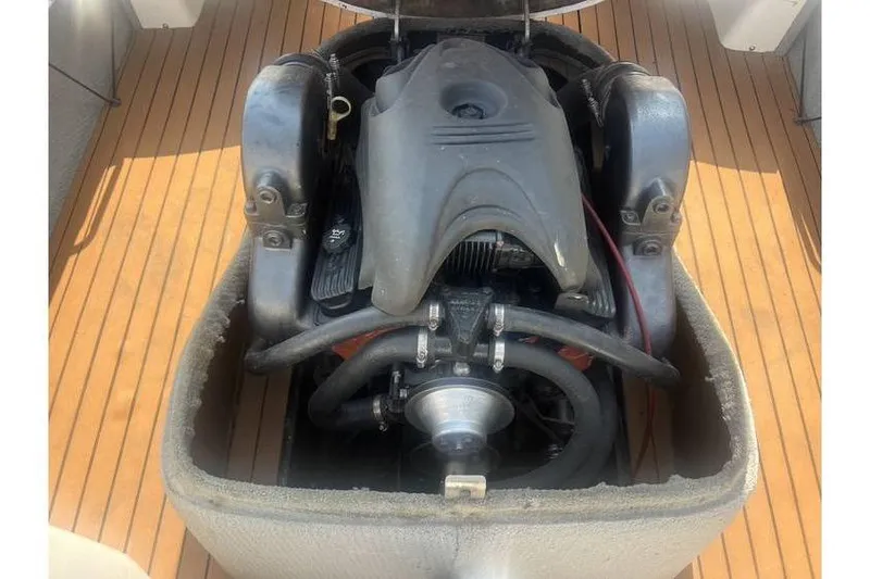 Slide: The Image of 1999 MasterCraft Prostar 205 engine on teak deck, detailed view. - 10