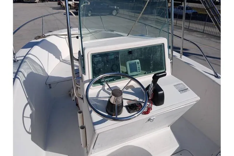 Slide: The Image of Steering console of a 2000 Trophy 1800 boat with navigation equipment. - 9