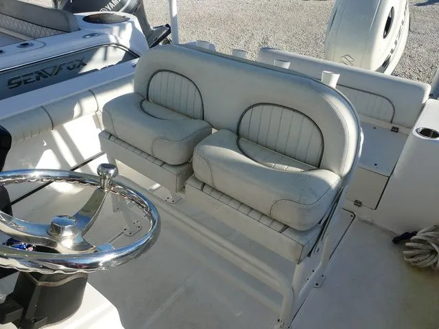 Slide: The Image of 2019 Sea Born LX22 Center Console helm with steering wheel. - 12