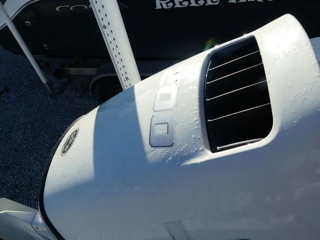 Slide: The Image of 2019 Sea Born LX22 Center Console boat in parking lot. - 19