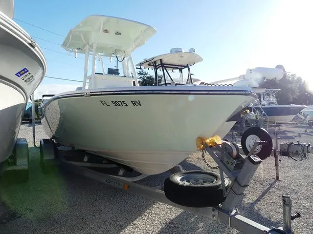 Slide: The Image of 2019 Sea Born LX22 Center Console on trailer outdoors. - 3