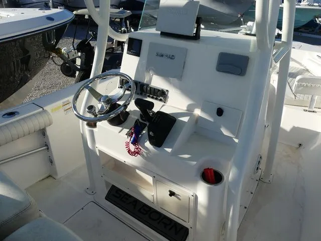 Slide: The Image of Interior of a 2019 Sea Born LX22 Center Console boat. - 9