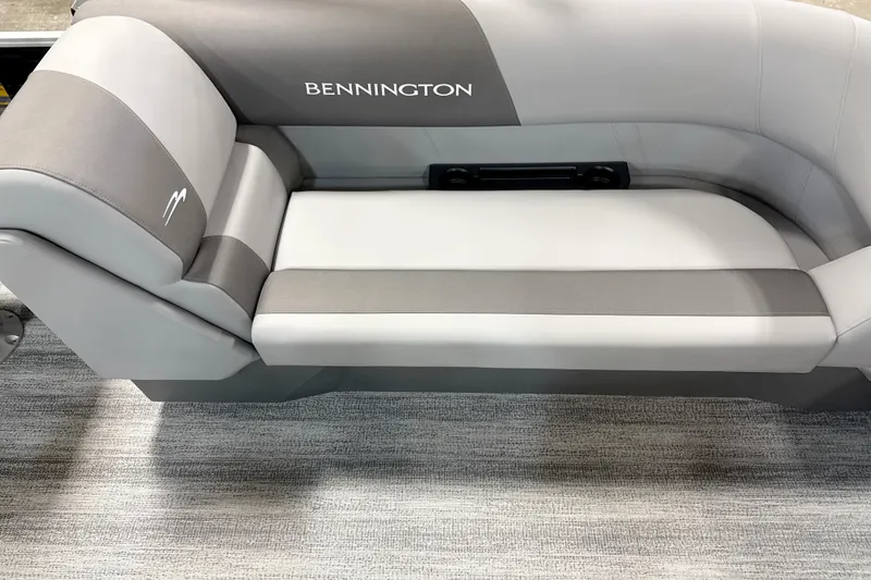 Slide: The Image of 2025 Bennington SSR boat seat in gray and white upholstery, showcasing modern design. - 5
