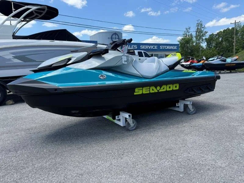 Slide: The Image of 2026 Sea-Doo GTI SE 130 jet ski displayed in parking lot. - 17