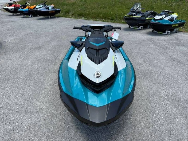 Slide: The Image of 2026 Sea-Doo GTI SE 130 jet ski on parking lot. - 18
