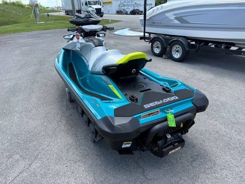 Slide: The Image of 2026 Sea-Doo GTI SE 130 jet ski parked outdoors. - 20